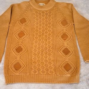 HERALD 100% pure wool crewneck sweater.  Wool is golden in color…